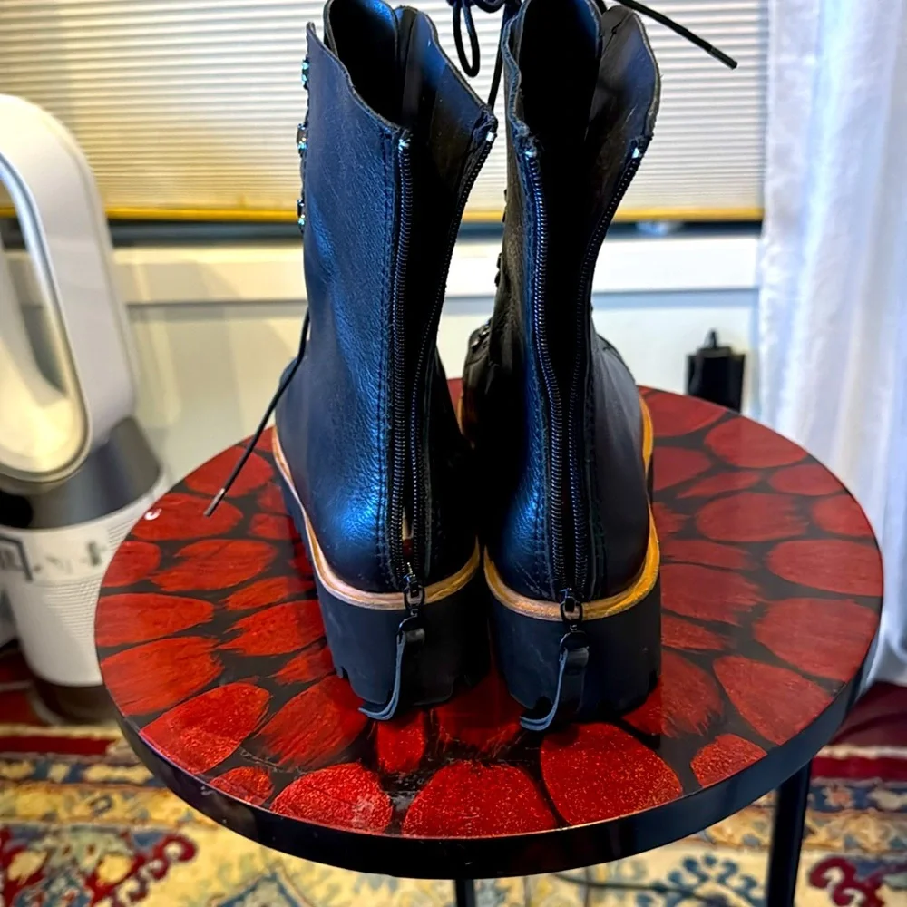 Absolutely gorgeous ALL BLACK platform Boots like new!